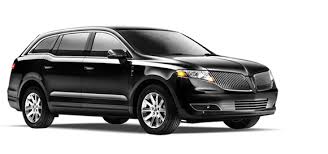 Black car 3 person sedan Lincoln MKT